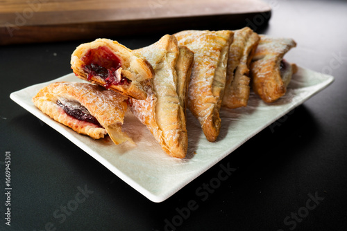 Puff pastry triangles with jam. Dessert. Pastry. Dough