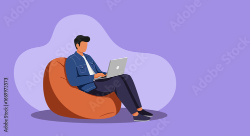 Man working remotely on a laptop while comfortably seated on a bean bag chair. Illustrates flexible work, freelance, and modern lifestyle concepts.
