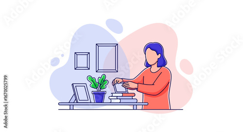 Woman working at desk with books and plant