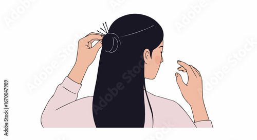 Young woman styling hair into a bun with hairpins at home  