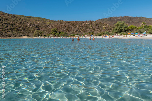 Fototapeta Naklejka Na Ścianę i Meble -  The transparent sea of ​​the white sand beach Cala Pira, Sardinia, Italy