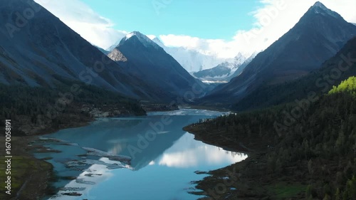 Majestic mountain lake reflecting pristine wilderness in the altai mountains. Media