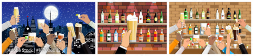Hands of men cheering with drinks at night cityscape celebration and at bar counter. Friends enjoying alcohol beverages.