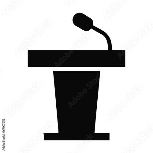 Microphone on top the podium is rectangular in shape and has a flat base