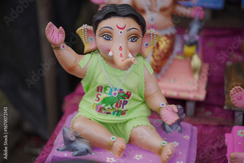 Photography Lord Ganesha idol for Ganesh Chaturthi festival in India, Colorful Ganpati statue Stock Photo, Lord Ganesha murti