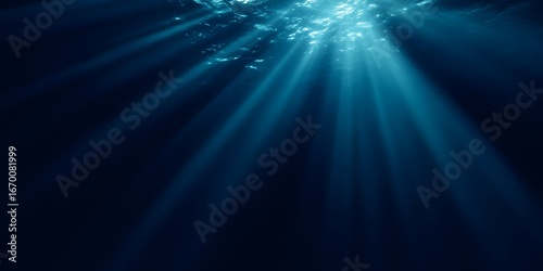 A dark blue background with rays of light shining down, creating an underwater effect. 