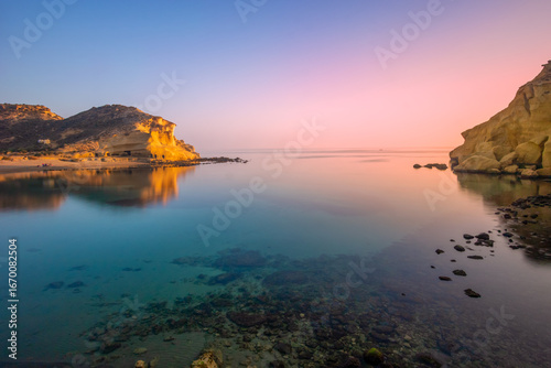 Los Cocedores Beach, between the provinces of Murcia and Almería, Spain, with a beautiful sunset.