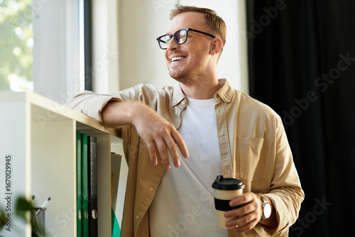 Bilde på lerret Young businessman enjoys a moment of relaxation while working in a modern office