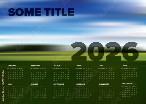 A 2026 yearly dark calendar displayed on a photo placeholder background. The bold '2026' is prominently featured, enhancing readability and modern design.
