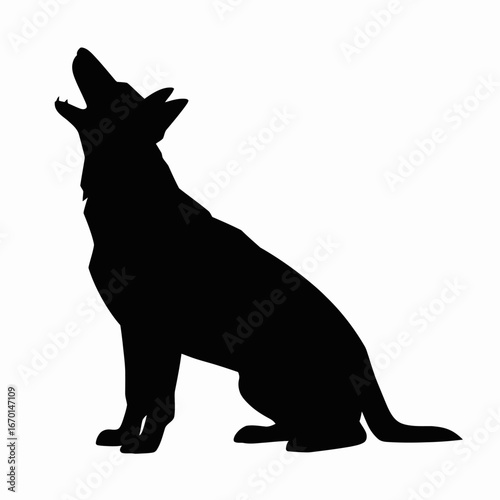 Silhouette of a dog howling at the moon