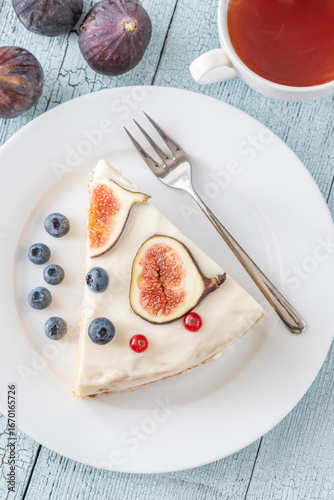 Wallpaper Mural Cake wedge topped berries figs served tea cup rustic cozy setting Torontodigital.ca