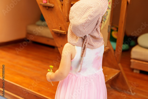Adorable little girl in a p...