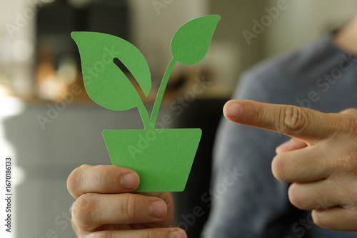 Image of a person pointing ...