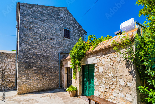 Old stone houses in historic town of Sveti Filip i Jakov in Dalmatia, Croatia 