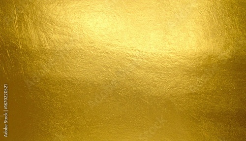 Radiant Gold Leaf Background with Brushed Texture and a Luminous Central Sheen.