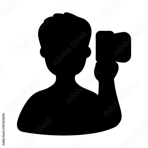 Silhouette of a photographer holding a camera up to take a picture