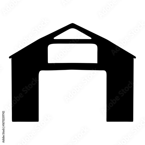 Silhouette of a barn or shed structure with an open doorway