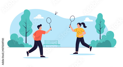 Young couple enjoying a game of badminton in a sunny park on a beautiful day