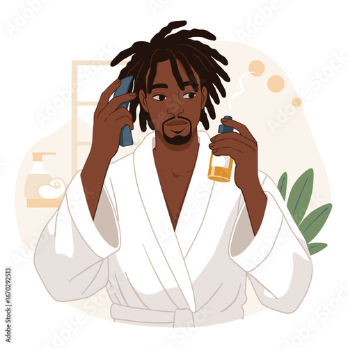 Young Black man applying hair product while wearing bathrobe at home  