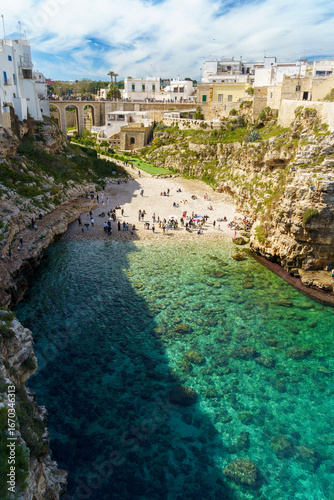 Vertical view of Lama Monachile beach in Polignano a Mare, Apulia, Italy
