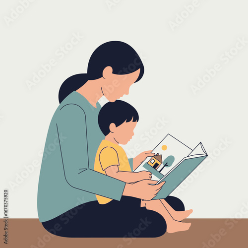 Mother reading a book to her child while sitting indoors.