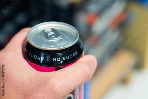 Hand Holding a No Sugar Beverage Can