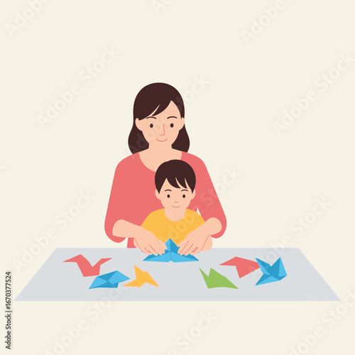 Mother and child making origami birds together at a table.