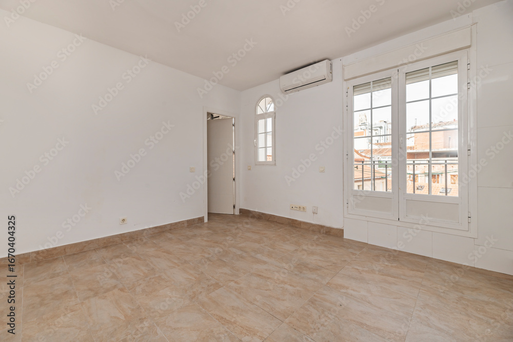 Obraz premium Bare space with distressed wood flooring, ideal for an industrial or vintage style