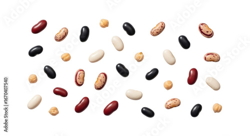 Assorted colorful beans scattered on a seamless black background