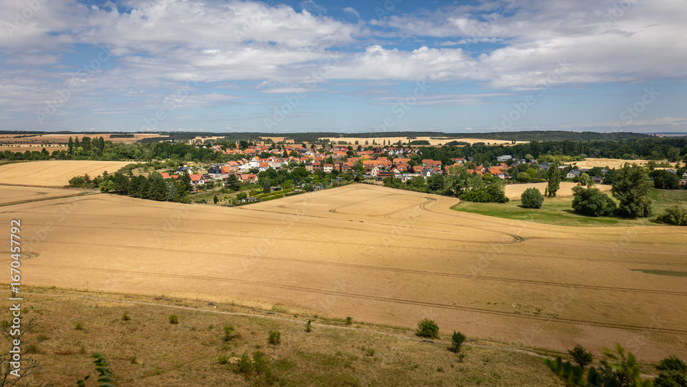 Obraz premium If you climb the 'teufelsmauer', also known as devil's wall, or adlersklippen or eagle crags, you will be rewarded with a beautiful view over the village of Weddersleben