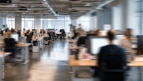 Busy office interior with many workers