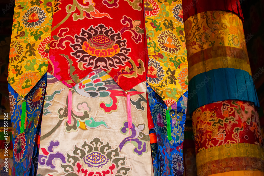 Naklejka premium Buddhist thangka - a Tibetan Buddhist painting on cotton, or silk applique - in a monastery in Ralong, Sikkim, India. Image shot with permission.