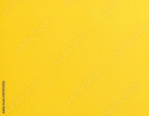 Plain bright yellow wall texture