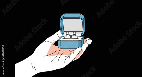An open ring box held in a hand on a black background offering a special surprise for a loved one