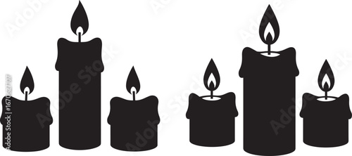 Group of black candles burning brightly silhouette