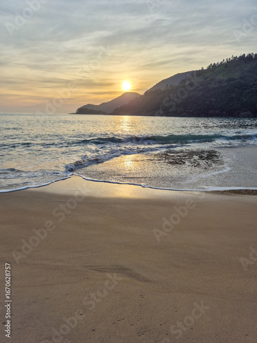 Beautiful pink sunset on a paradisiacal beach