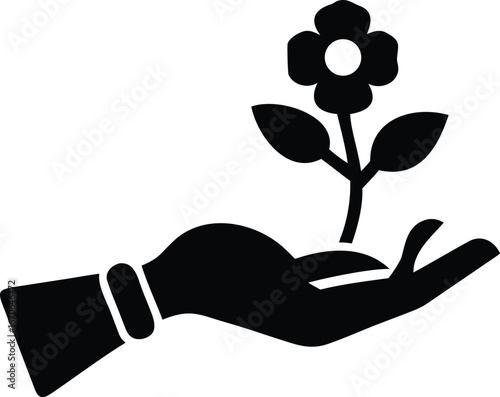 Black silhouette of a hand holding a growing plant with a flower on a white background growth