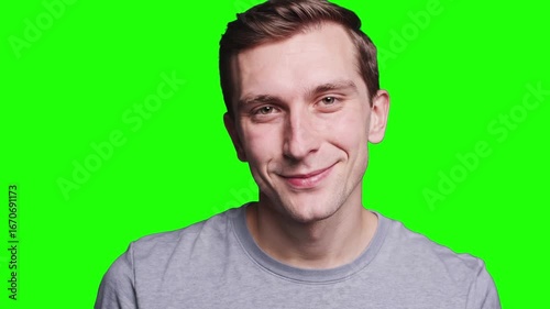 Wallpaper Mural Studio video of a Caucasian adult male smiling warmly and confidently in front of a green screen background. Ideal for chroma key projects, business presentations, lifestyle content, communication, an Torontodigital.ca