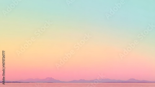 A serene landscape bathed in pastel hues, showcasing a gentle horizon line with soft mountain silhouettes against a vibrant ombre sky.
