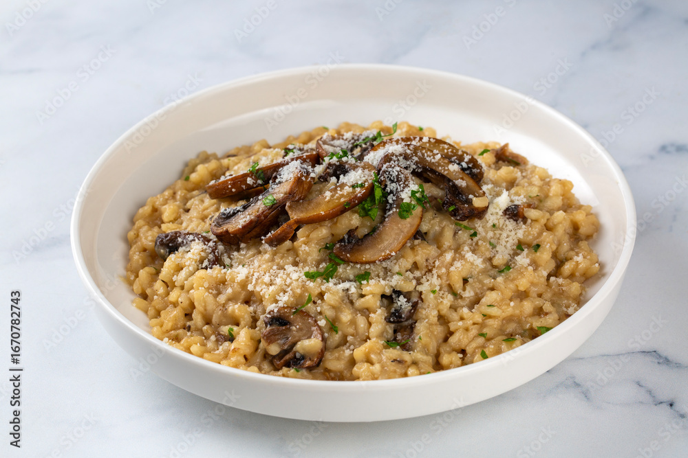 Mushroom risotto topped with parmesan cheese Mushroom risotto topped with parmesan cheese