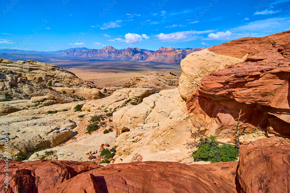 Fototapeta premium Red Rock Canyon Calico Sandstone Formations and Nevada Desert Under Blue Sky