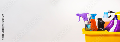 Schilderij op canvas Bright multi-colored cleaning products, household chemicals bottles and sprays,