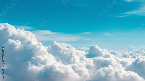 fluffy white clouds covering blue sky natural background