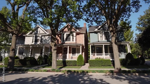 Sequence of Three Timber Constructed Dwellings Located in Particular Urban District