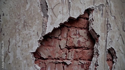 Aged and Deteriorated Vertical Partition Showing Signs of Damage to Plasterwork and Perforation