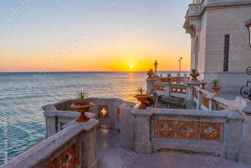 Photography Scenic sunset view from Miramare Castle terrace overlooking Adriatic Sea horizon