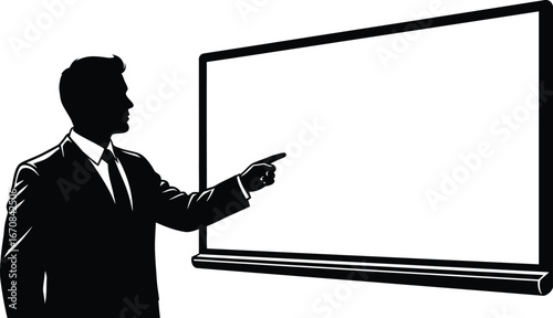 Silhouette of a man in a suit pointing at a presentation screen.