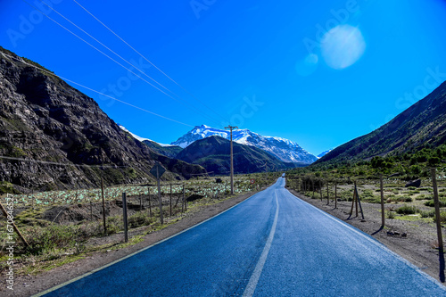 road with views of the mountains in Cajon del Maipo in Chile