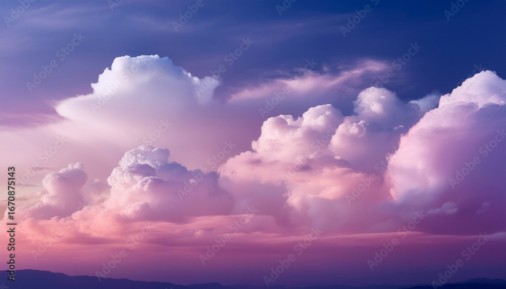 Obraz premium a soft dreamy sky with a gradient of pink and purple hues featuring wispy white clouds