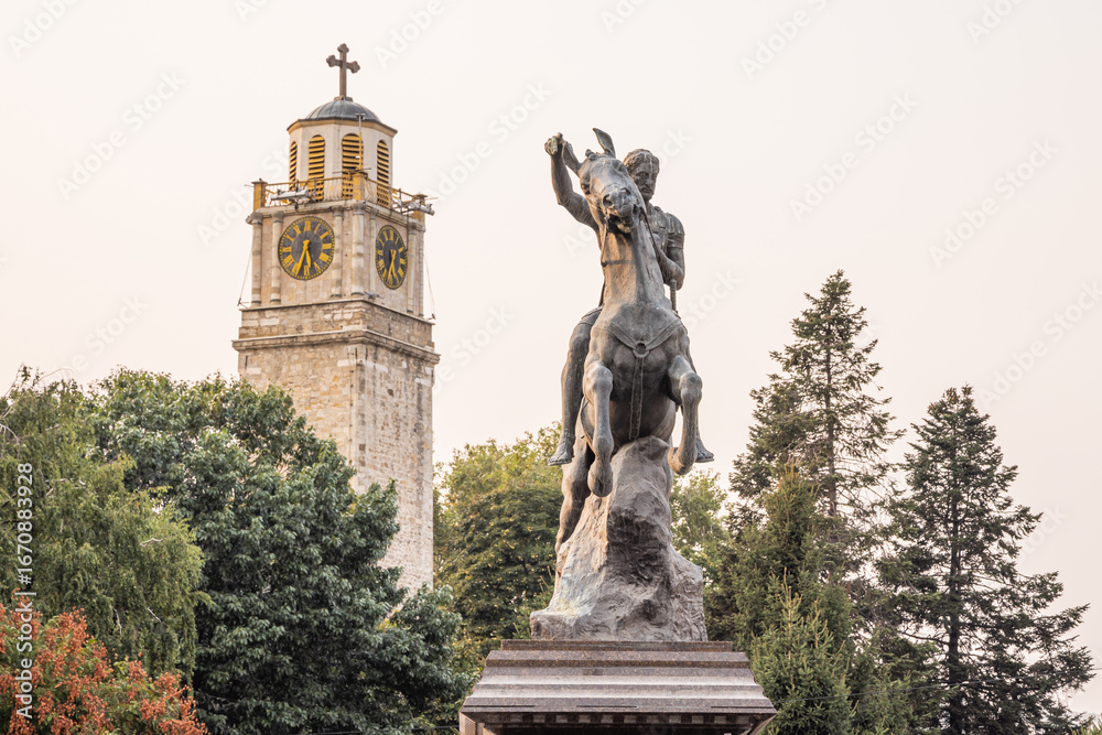 Clock tower and equestrian statue of King Philip of Macedonia. Clock tower and equestrian statue of King Philip of Macedonia.